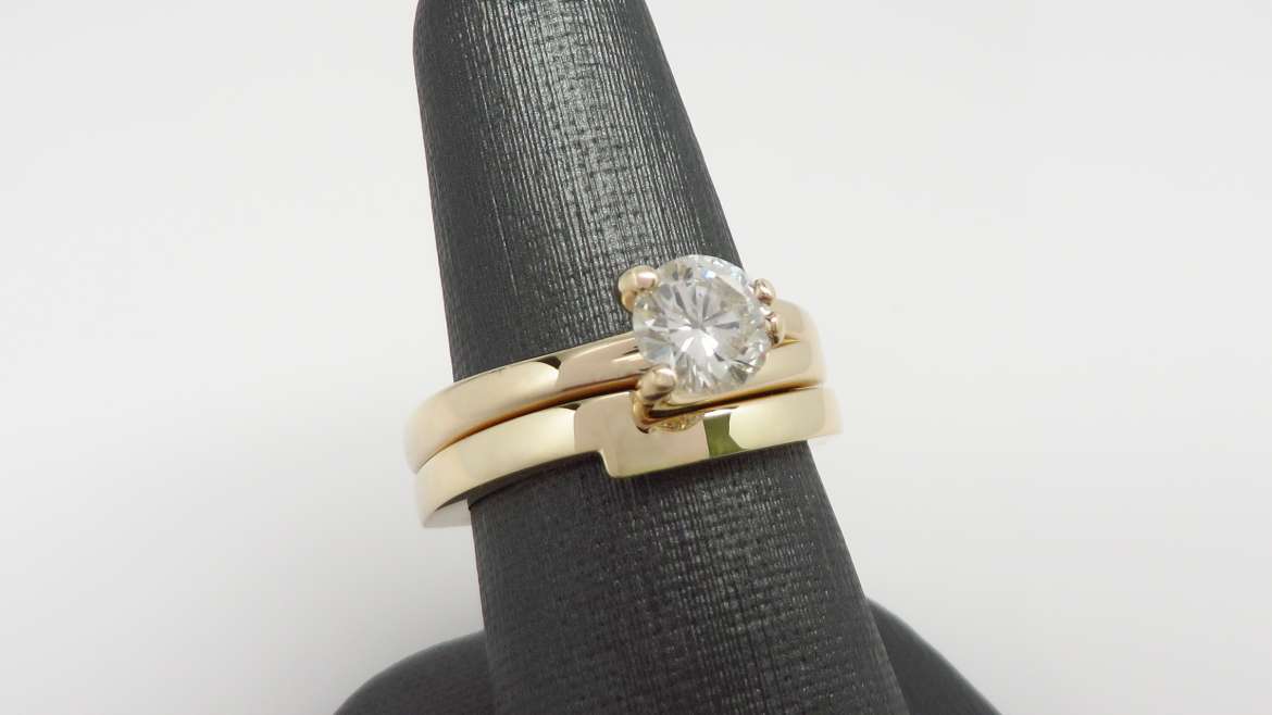 Alliance 14 k jaune sertis d&rsquo;un diamant d&rsquo;un 0.90 ct