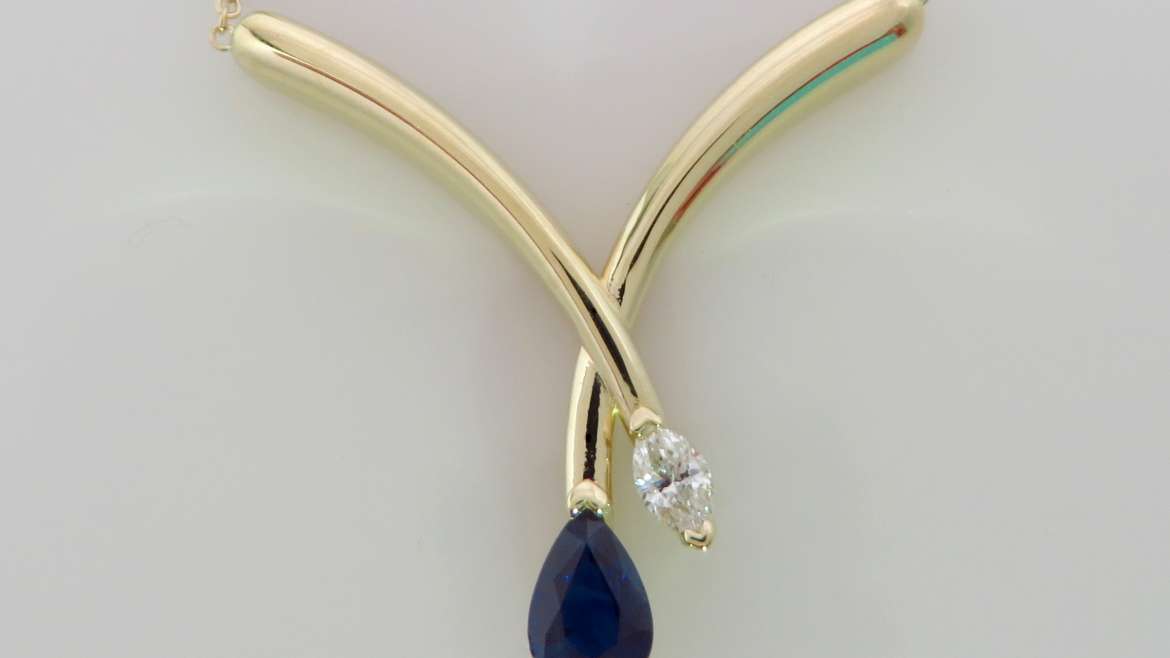 pendentif en or 10 k jaune sertis d&rsquo;un saphir et d&rsquo;un diamant